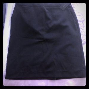 Black Skirt, size 4 never used with tag on it .
